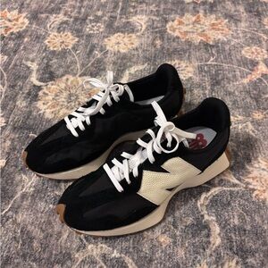 Women’s Black and White New Balance 327s